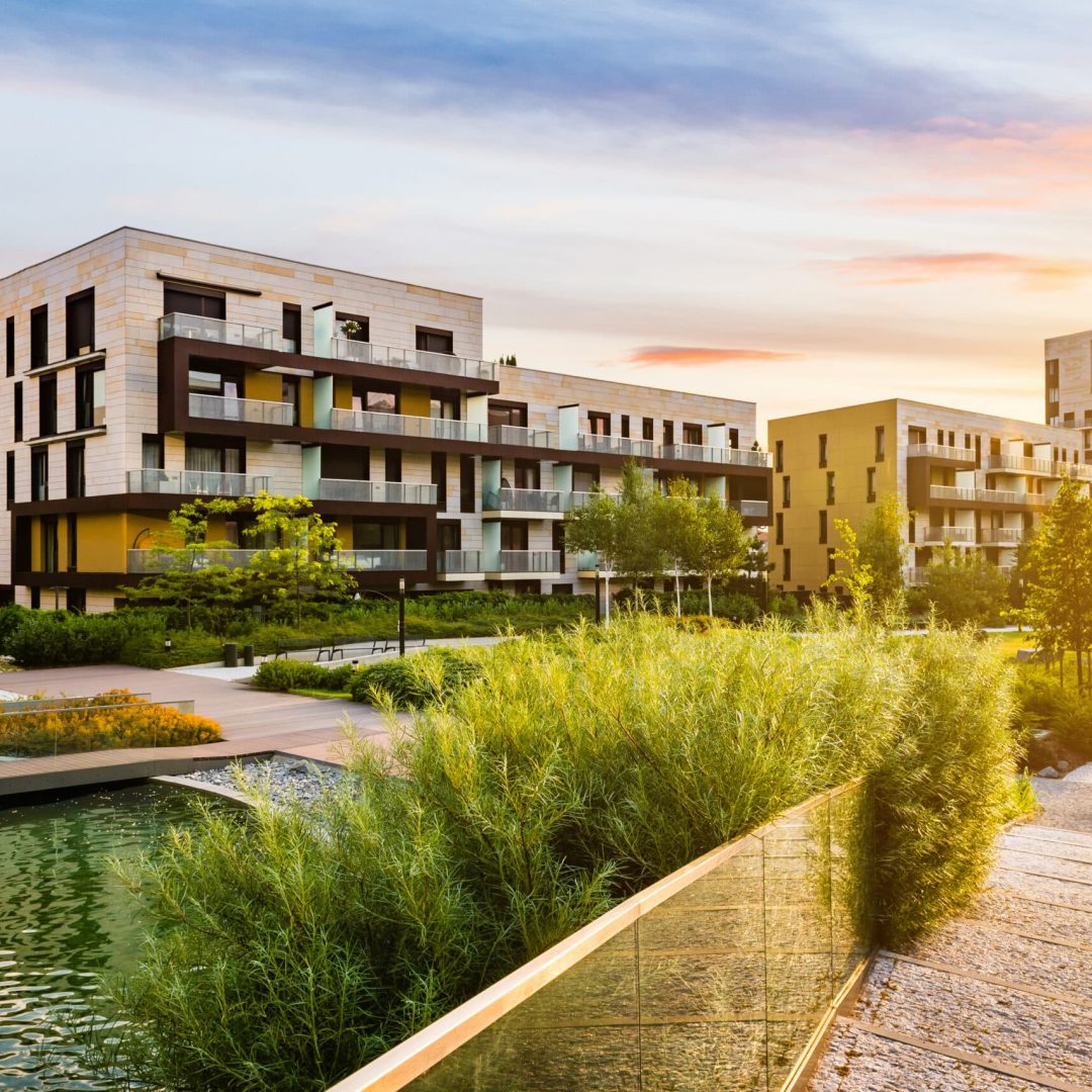 Residential,Building,In,The,Public,Green,Park,During,Sunrise